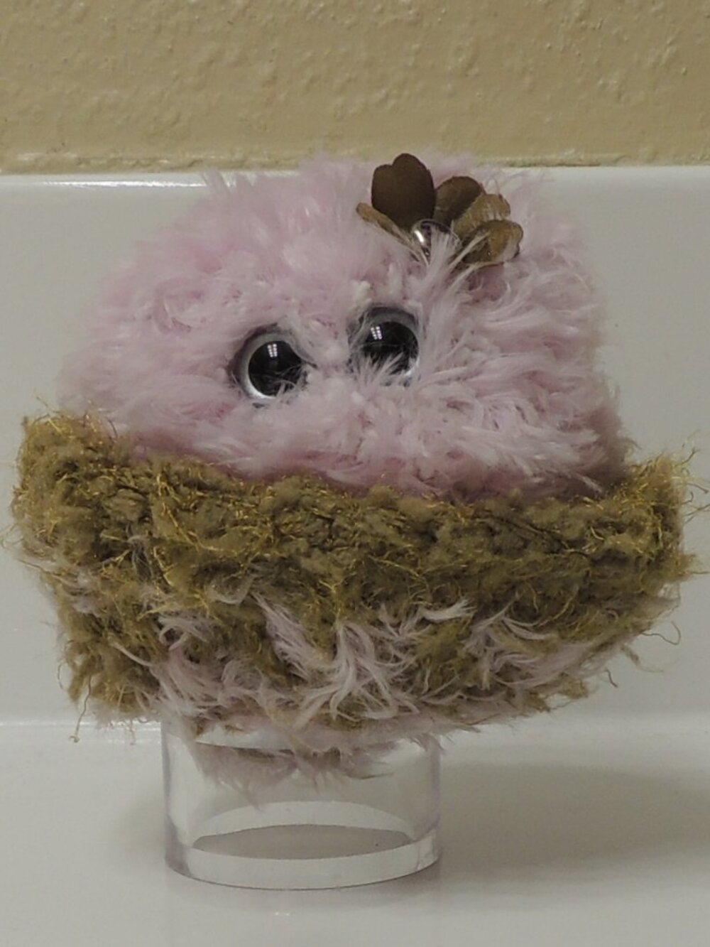 Buttfreckle, pink in nest